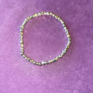 7” sterling silver stretch bracelet. Geometric silver and hematite balls